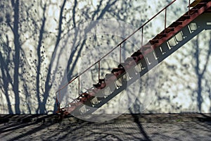 Stairs up the wall with shadow