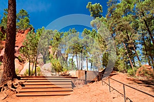 Stairs on wlking path on Le Sentier des Ocres in Roussillon in F