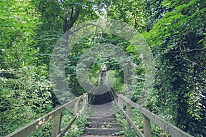 Stairs with wooden railing, village of Luss Scotland