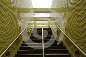 Stairs with yellow walls