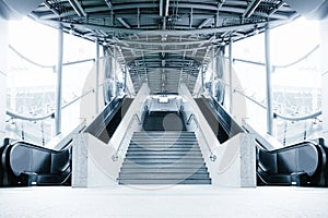 Stairway Electric Escalator of Shopping Mall, Modern Indoor Escalators and Interior Decoration in Shopping Supermarket.