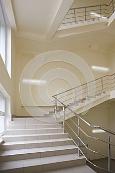 Stairway with metal handrails