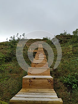 Stairway in the nature up to the sky