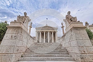 Stairway between Plato and Socrates' Greek philosophers in front of the national academy's neoclassical building.