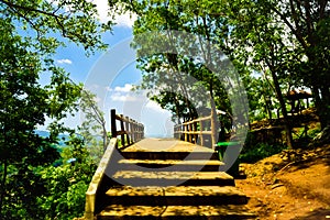 Stairway to heaven with bridge overlooking mountain view