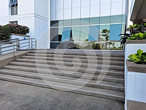 Stairway to office building with glass windows