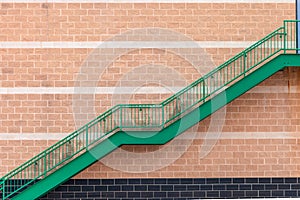 Stairwell fire or emergency exit on wall of building, abstract background