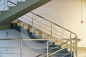 Stairwell in a modern building. Staircases as an emergency evacuation exit from the building in case of fire or emergency. Clean