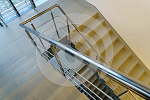 Stairwell in a modern building. Staircases as an emergency evacuation exit from the building in case of fire or emergency. Clean