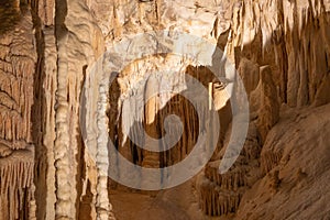 Stalactite and Stalagmite formations into the Frasassi Caves Grotte di Frasassi, Marche, Ancona, Italy
