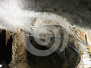 Stalactite and stalagmite of Postojna Cave.