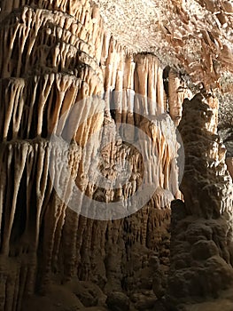 Stalactite and stalagmite of Postojna Cave.