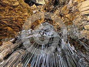 Stalactites on the cave`s ceiling