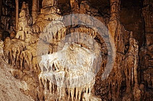 Stalactites and stalagmites in a cave. Beautiful stone texture