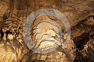 Stalactites and stalagmites in a cave Croatia photo