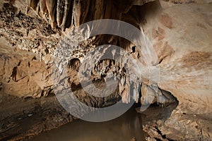 Stalactites and stalagmites in a cave,at national park of Thailand