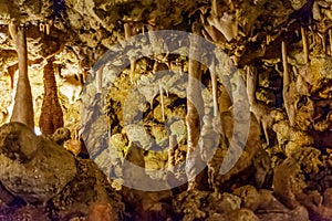 Stalactites and stalagmites in a cave underground