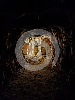 Stalactites and Stalagmites forming pillars in salt mine.