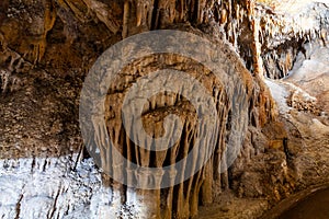 Stalagmite formations in limestone cave.