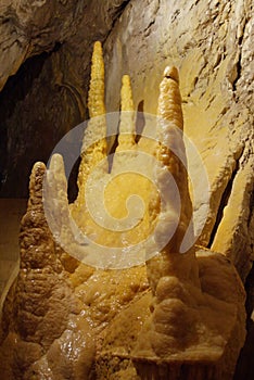 Stalagmites in grotto photo
