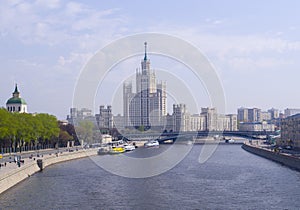 Stalin`s Skyscraper in Moscow near the river. background.