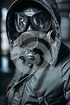 Stalker in gas mask, radiation danger