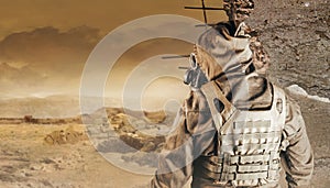 Stalker in soviet gas mask on desert wasteland background