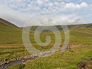 The Stalkers Footbridge over the Waters of Saugh in Glen Lethnot photo
