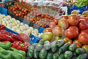 Stall of mushrooms, green, red pepper, cucumber, tomato at the Graca market in Ponta Delgada, Azores, Portugal
