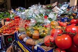 Stall selling tomatoes at Borough Market, in Southwark, east London UK.