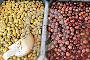 Stall with Tsakistes and Amfissa olives at street market