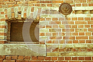 Stall window with brick lintel in a brick wall  2