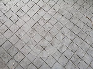 Stamp concrete black grey color hardener printing patterns on the cement or mortar surface block shape Square pattern material