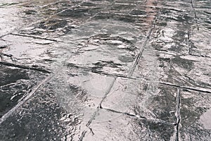 Stamp concrete texture pattern and background, and reflection of sunlight on the floor.