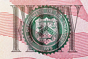 Stamp of the Department of The Treasury on US fifty dollar bill closeup macro