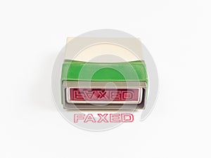 Stamp with faxed in red ink