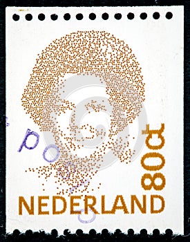 Stamp printed in the Netherlands shows Queen Beatrix
