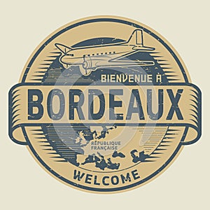 Stamp or tag with airplane and text Welcome to Bordeaux, France