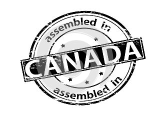 Stamp with text Assembled in Canada