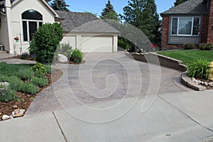 stamped and colored concrete driveway photo
