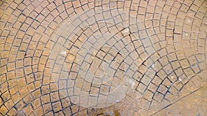 Stamped concrete pavement outdoor, mimics cobblestones pattern