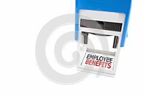 Stamper labeled Employee Benefits on white background