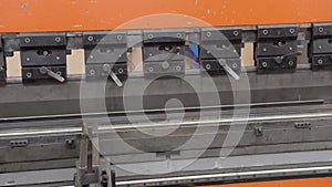 The stamping press of the metal blank which is carrying out molding, details at machine-building plant