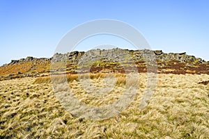 Stanage Edge on a bright, misty winter morning