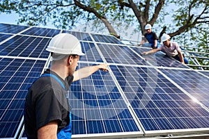 Stand-alone exterior solar panel system installation, renewable green energy generation concept.