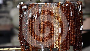 A stand with amber necklaces