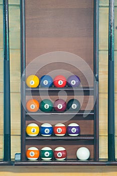 Stand for billiard balls arranged in order, background