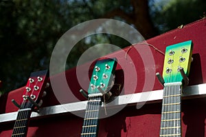 Stand with colorful guitars - 2