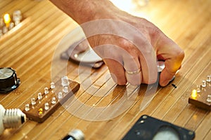 Stand with elements of electricity hand