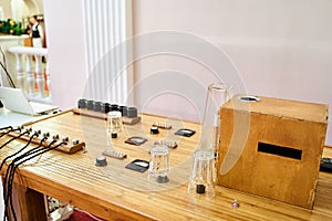 Stand with elements of electricity